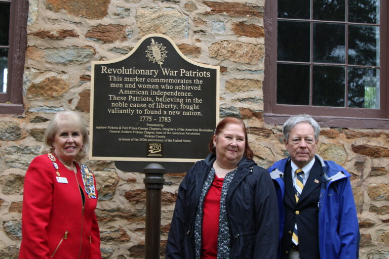 Fort Prince George DAR Chapter Regent Carolyn Nations, Andrew Pickens Chapter DAR Regent Darlene Dowdy, and General Andrew Pickens SAR Chapter President Bud Starnes. (Photo by Karen Brewer, The Pickens County Chronicle)