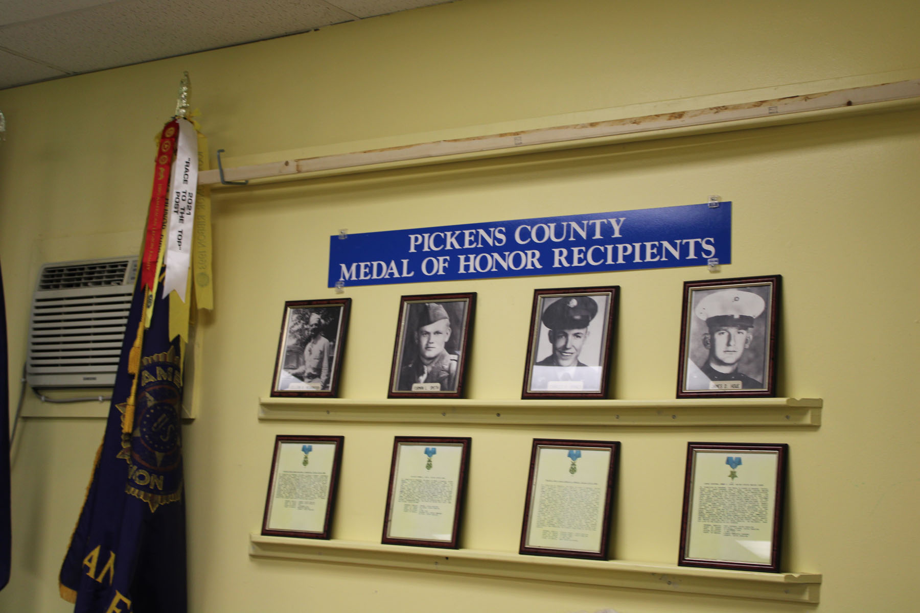 Photos of Pickens County's Medal of Honor Recipients on a Wall in the Legion Hut