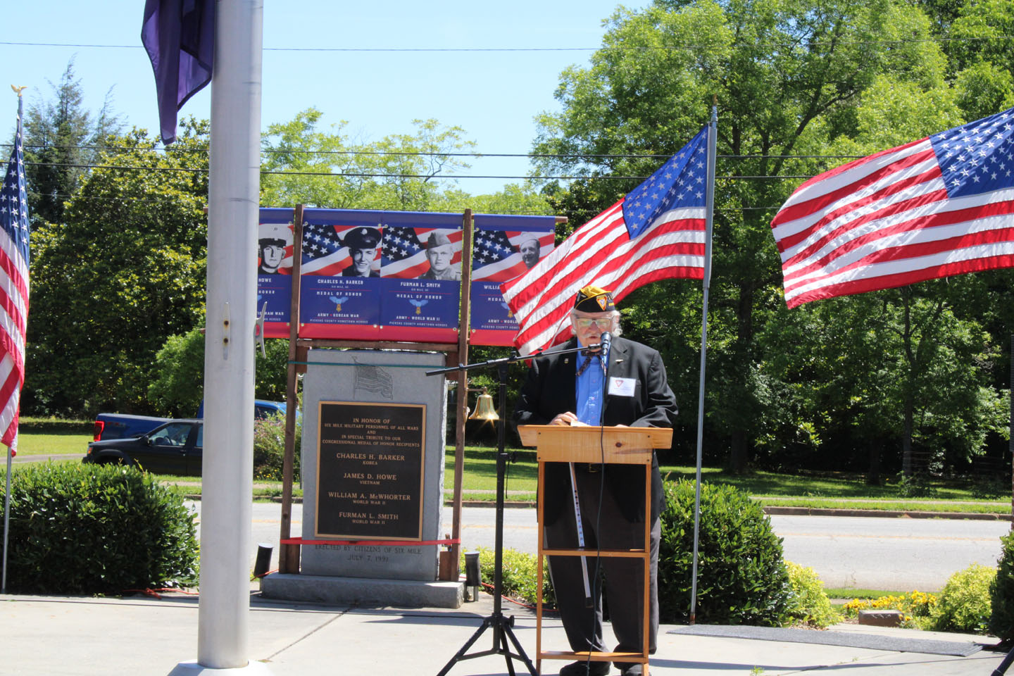 Tom Jurkovich, Fleet Reserve Association, gives the invocation