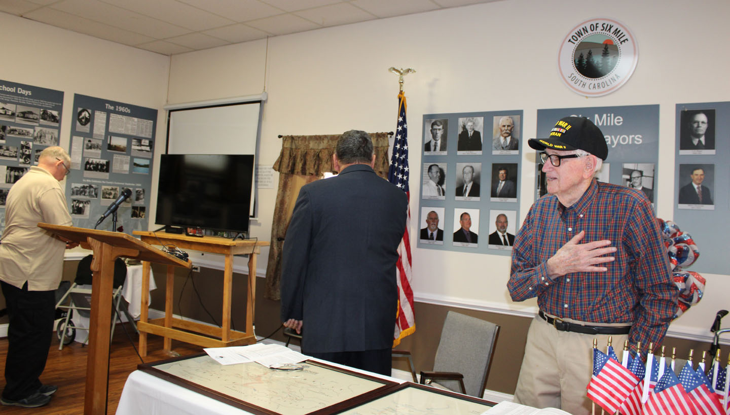 Mayor Atkinson leads in the Pledge of Allegiance to the American flag. (Photo by Karen Brewer, The Pickens County Chronicle)