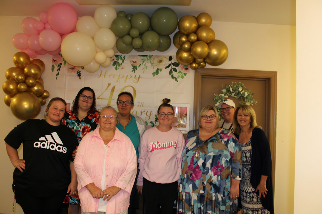 Helping Hands staff at the 40th anniversary, including Rocksy Vorhies, Falisha Gibson, Evelyn Price, Victoria Thompson, Stacey Null, Janet Stephens, Ashley Reno , Brigitte Stephens (Photo by Karen Brewer, The Pickens County Chronicle)