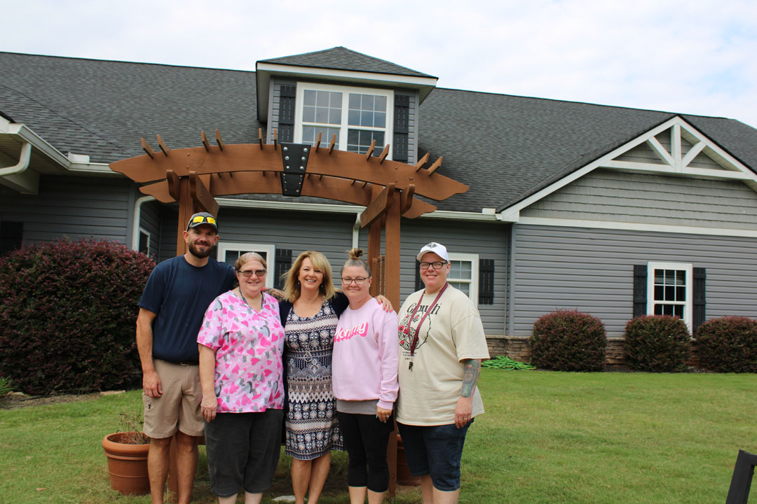 Cooking staff members Robert, Sandy Bishop, Executive Director Brigitte Stephens, house parents Stacey Null and Ashley Reno (Photo by Karen Brewer, The Pickens County Chronicle)