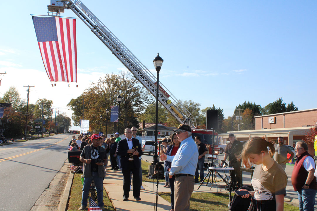 Commander Walt Carter introduces American Legion Post 52 member Marion Summey (Photo by Karen Brewer, The Pickens County Chronicle)