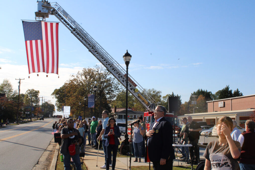 Marion Summey, of the American Legion Post 52, sings the national anthem (Photo by Karen Brewer, The Pickens County Chronicle)