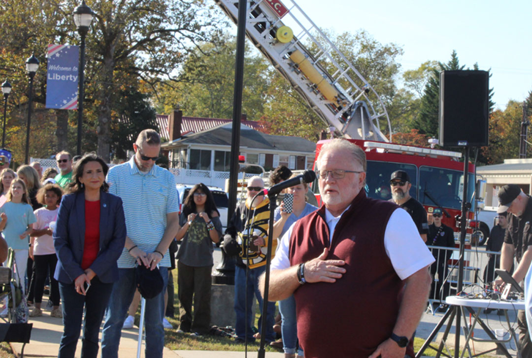 Rev. Carlton Cleveland, Pastor of Potter's Clay Fellowship in Liberty, just before opening with prayer (Photo by Karen Brewer, The Pickens County Chronicle)