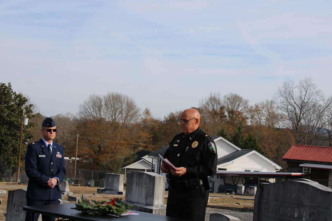 Pickens Police Chief Randal Beach welcomes everyone to the Wreaths Across America ceremony at Sunrise Cemetery. (Photo by Karen Brewer, The Pickens County Chronicle)