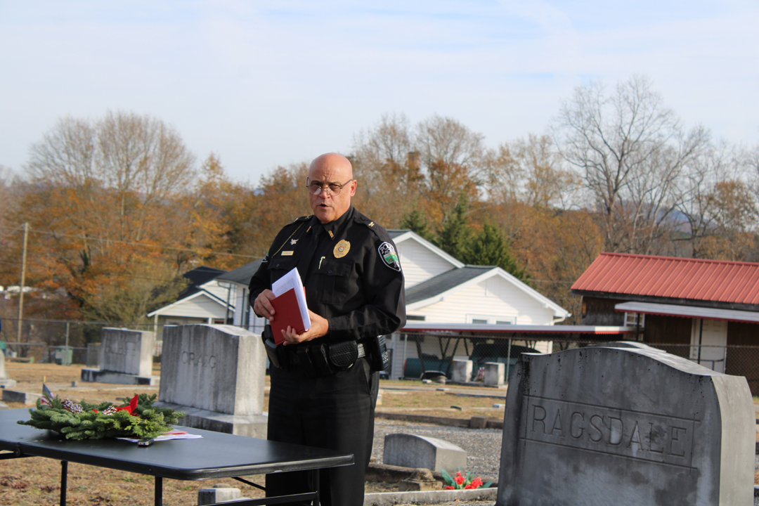 Chief Beach thanks the Knights of Columbus for replacing the old American flag with a flag that had flown on the USS Lassen, named for a Medal of Honor recipient, and thanks State Senator Rex Rice for the new South Carolina State flag. (Photo by Karen Brewer, The Pickens County Chronicle)