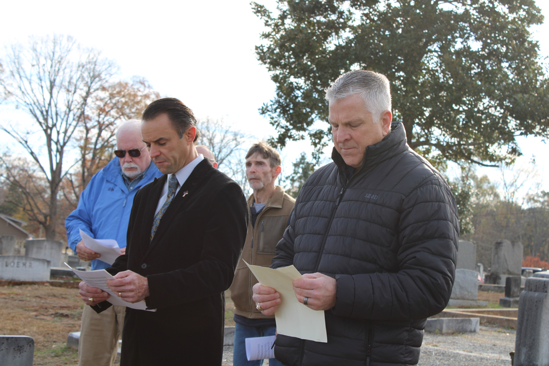 Matthew Kutilek, Lt. Col., USMC, and John Murrow, USAF Pararescue ret, read names of those veterans buried in Sunrise Cemetery. (Photo by Karen Brewer, The Pickens County Chronicle)