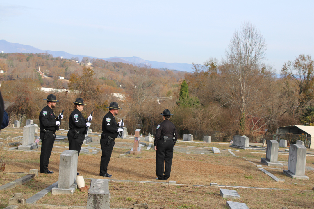 Pickens Police Department Veteran Honor Guard (Fowler, USMC, Wyatt, US Army, and Burton, US Army) with a 21-gun salute. (Photo by Karen Brewer, The Pickens County Chronicle)