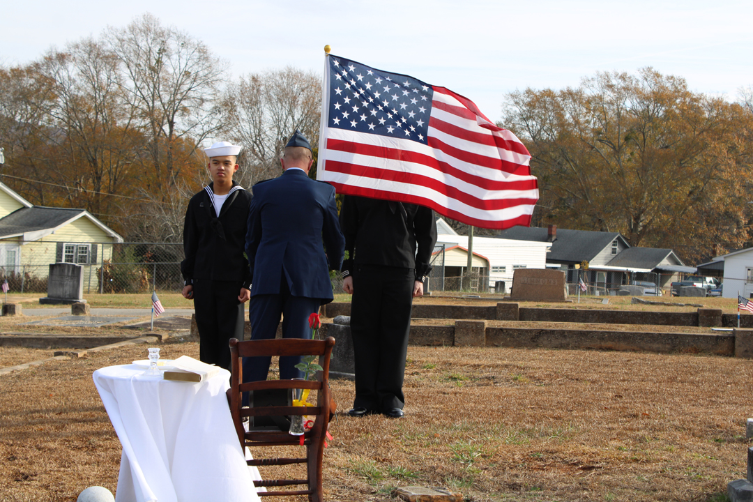 Major Newman lays the first wreath in honor of the unknown. (Photo by Karen Brewer, The Pickens County Chronicle)