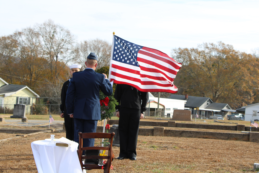 Major Newman lays the wreath in honor of the unknown. (Photo by Karen Brewer, The Pickens County Chronicle)