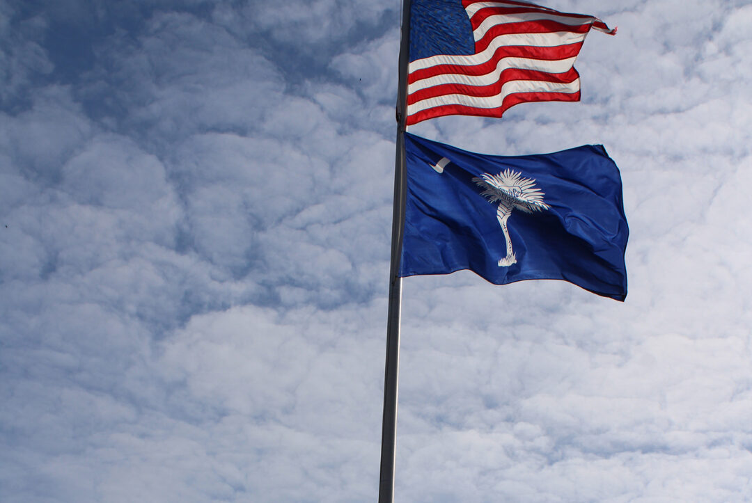 The American and South Carolina flags at Liberty Memorial Gardens (Photo by Karen Brewer, The Pickens County Chronicle)