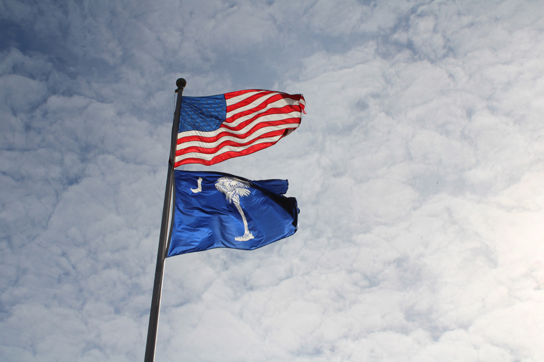 The American and South Carolina flags during the national anthem (Photo by Karen Brewer, The Pickens County Chronicle)