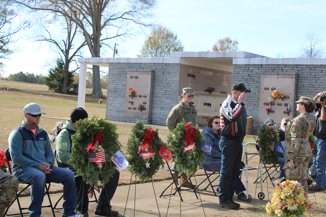 Scott Lang, US Air Force, salutes after placing a wreath in memory of those who served in the US Air Force (Photo by Karen Brewer, The Pickens County Chronicle)