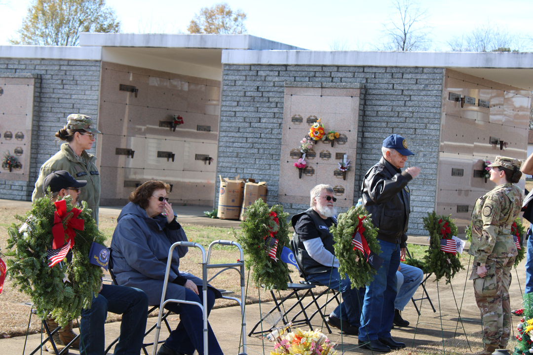 Frank Cantrell, US Army, past Commander of American Legion Post 67, salutes after placing a wreath in memory of those who served in the US Coast Guard (Photo by Karen Brewer, The Pickens County Chronicle)