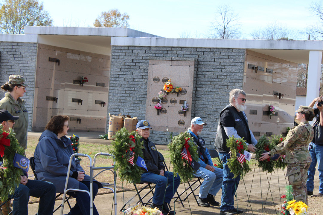 David McAllister, US Army, places a wreath in memory of those who served in the US Merchant Marine (Photo by Karen Brewer, The Pickens County Chronicle)