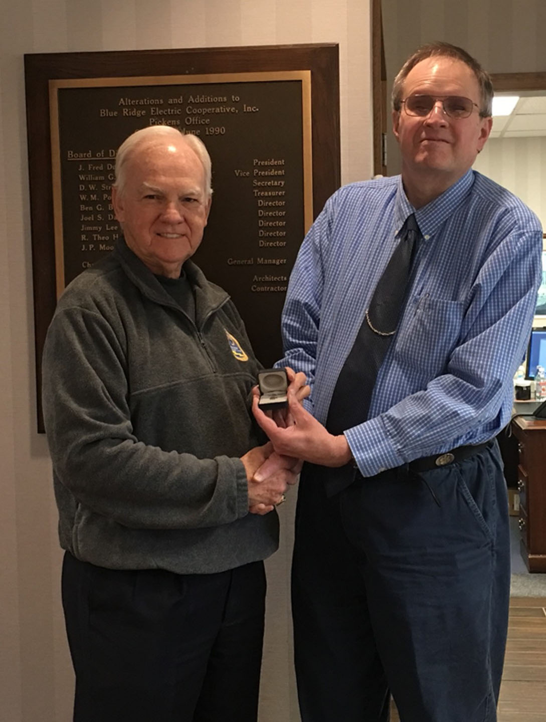 Mike Keasler, Customer Service Representative, pictured with past Blue Ridge Electric Cooperative President and CEO Charles Dalton (left) in Pickens (Photo courtesy of Blue RIdge Electric Cooperative)