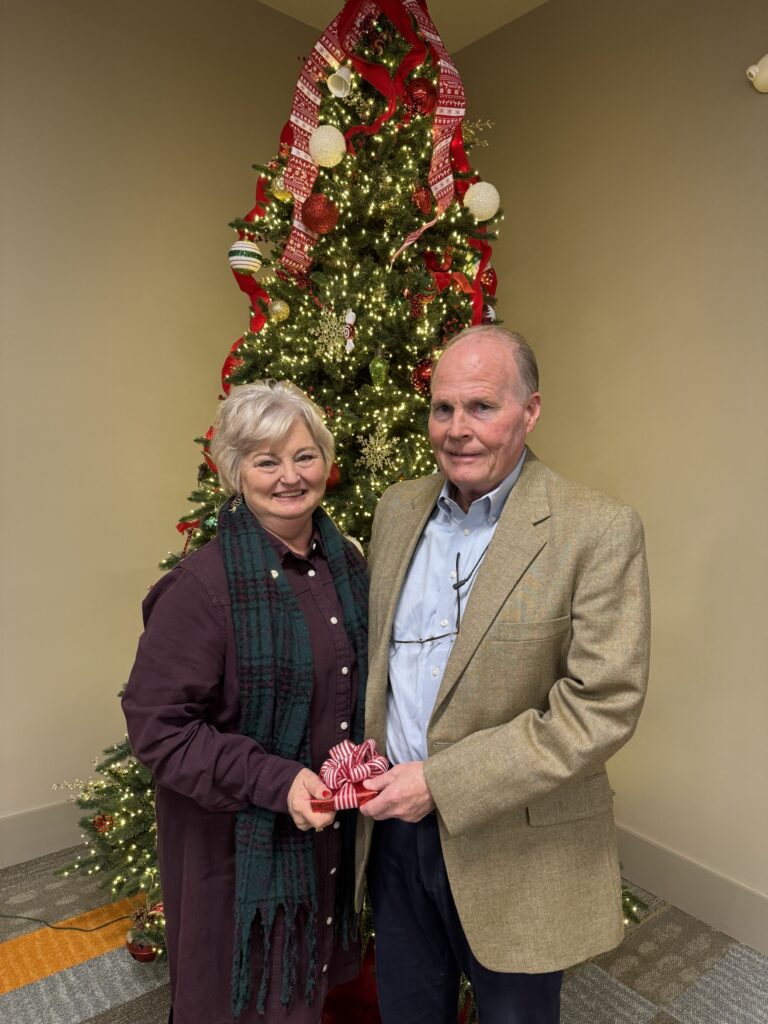 Dianne Lyles, Customer Service Representative, pictured with Blue RIdge Electric President and CEO Jim Lovinggood at a celebratory breakfast in Westminister in December (Photo courtesy of Blue Ridge Electric Cooperative)