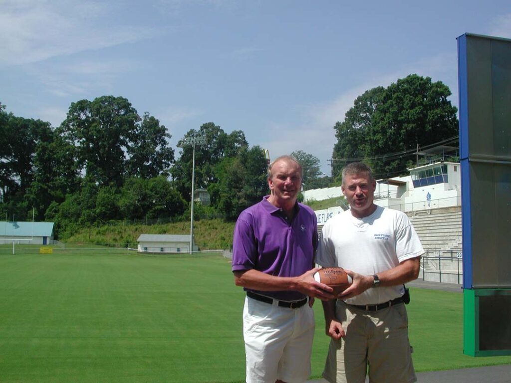 Sam with then Pickens High School Head Football Coach Andy Tweito (Photo by Karen Brewer)