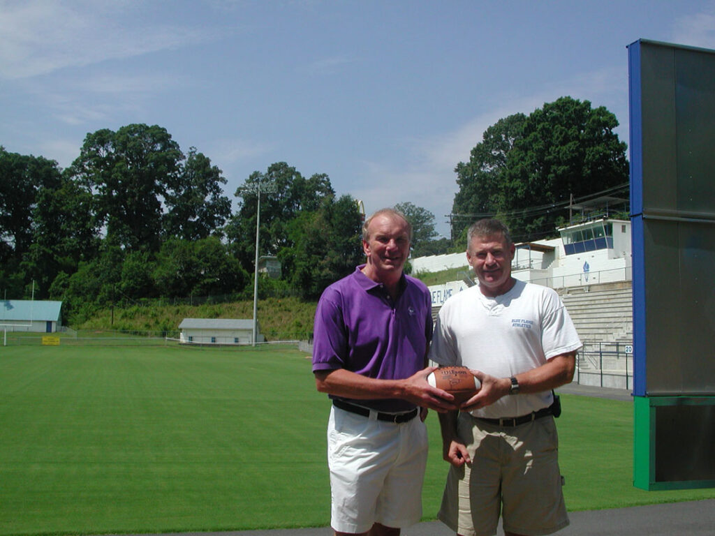 Sam with then Pickens High School Head Football Coach Andy Tweito (Photo by Karen Brewer)