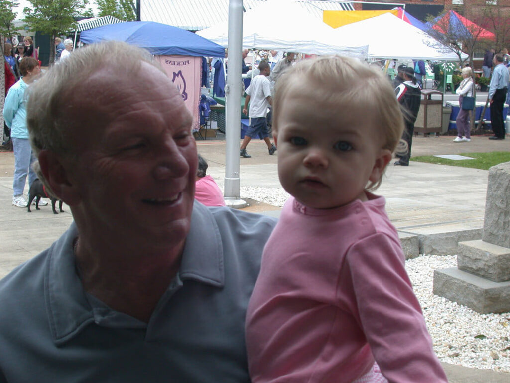 Sam with a granddaughter, Ryan, at the 2003 Pickens Azalea Festival (Photo by Karen Brewer)