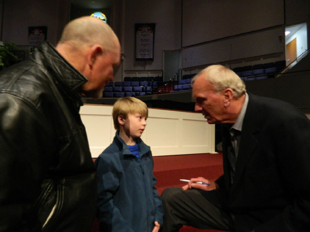 Sam with Jack Gallamore and a grandson, Gavin, in 2012 (Photo by Karen Brewer)