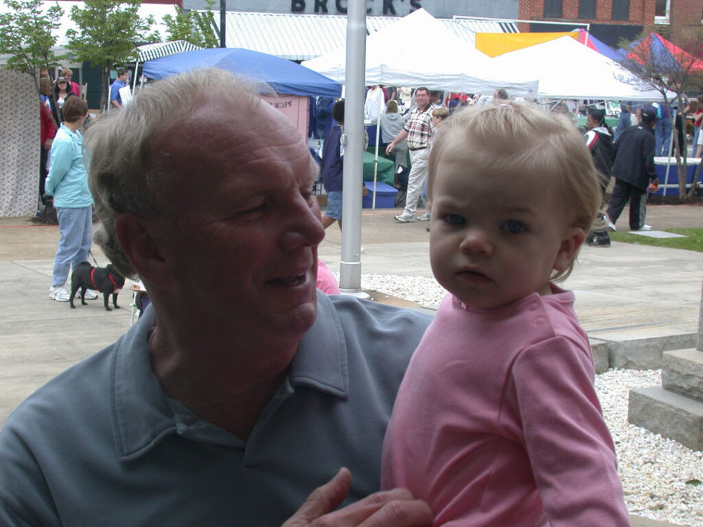 Sam with a granddaughter, Ryan, at the 2003 Pickens Azalea Festival (Photo by Karen Brewer)