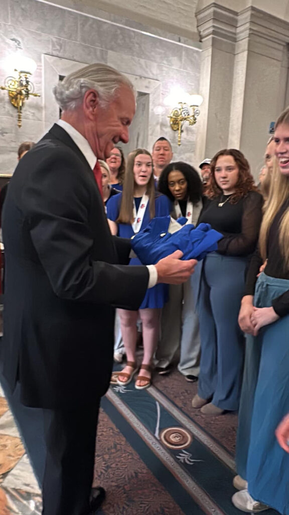Giving Governor Henry McMaster a Blue Flame t-shirt (Pickens Blue Flame Volleyball photo)