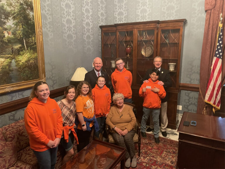 YAM founder Betty McDaniel and members of The Sweet Potato Pie Kids with State Senator Rex Rice and State Rep. Davey Hiott at the South Carolina State House (YAM photo)