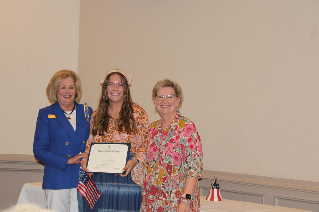 Julie Thompson with student Kaylen Kelley and her teacher, Denise Hodges (Photo by Karen Brewer, The Pickens County Chronicle)