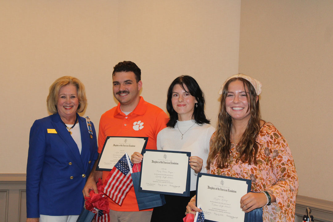 Julie Thompson with students Luke Hatfield, Mary Elaine Bryson, and Kaylen Kelley (Photo by Karen Brewer, The Pickens County Chronicle)