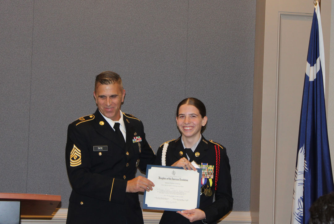 Student Samaya Field (right) with her JROTC instructor, 1st Sgt. Curtis Tate (Photo by Karen Brewer, The Pickens County Chronicle)