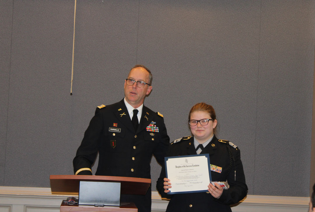 Student Maddison Elkins (right) with her JROTC instructor, Lieutenant Colonel John Rainville (Photo by Karen Brewer, The Pickens County Chronicle)