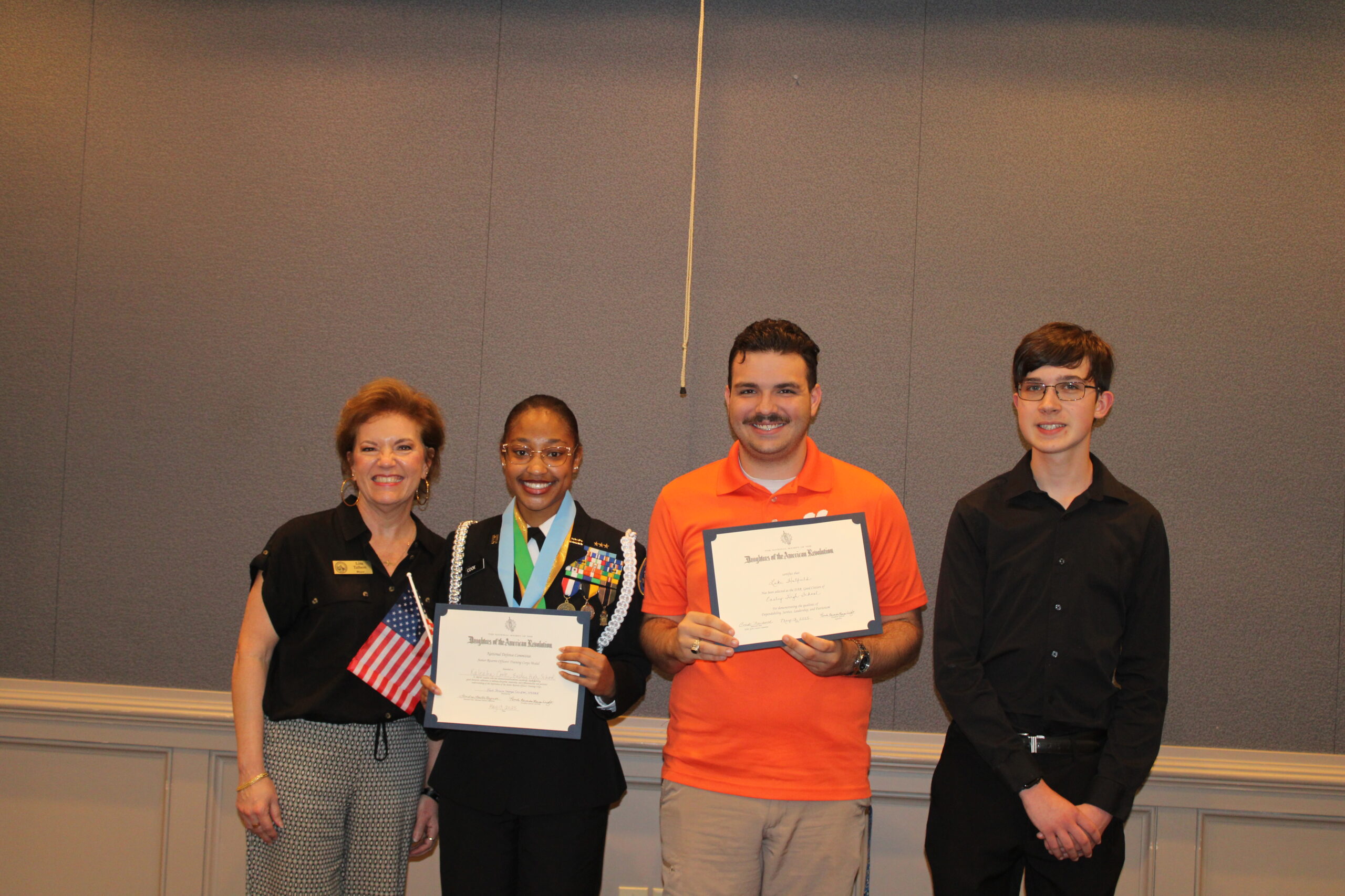 Easley Mayor Lisa Talbert with the Easley student award winners Kaleaha Cook, Luke Hatfield, and Luke Stone (Photo by Karen Brewer, The Pickens County Chronicle)