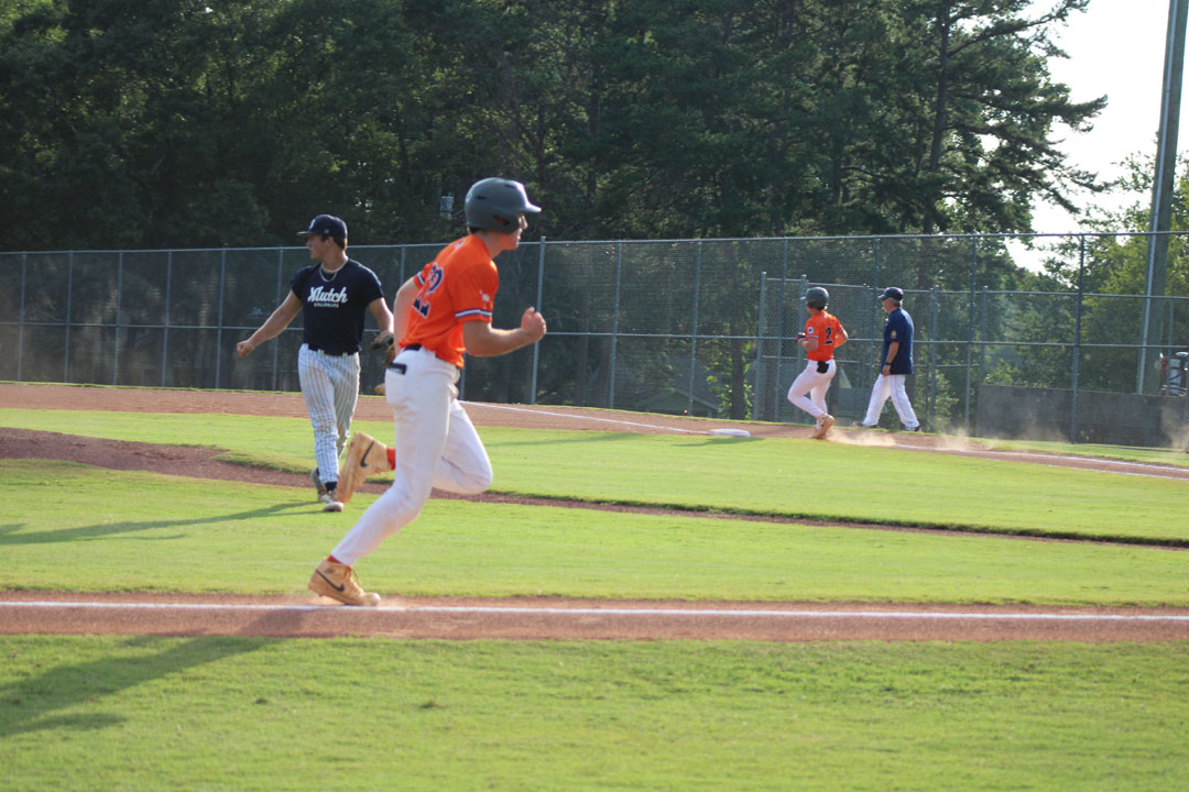 #2 Lee Turnipseed at first as #22 Quint Cumbie comes home