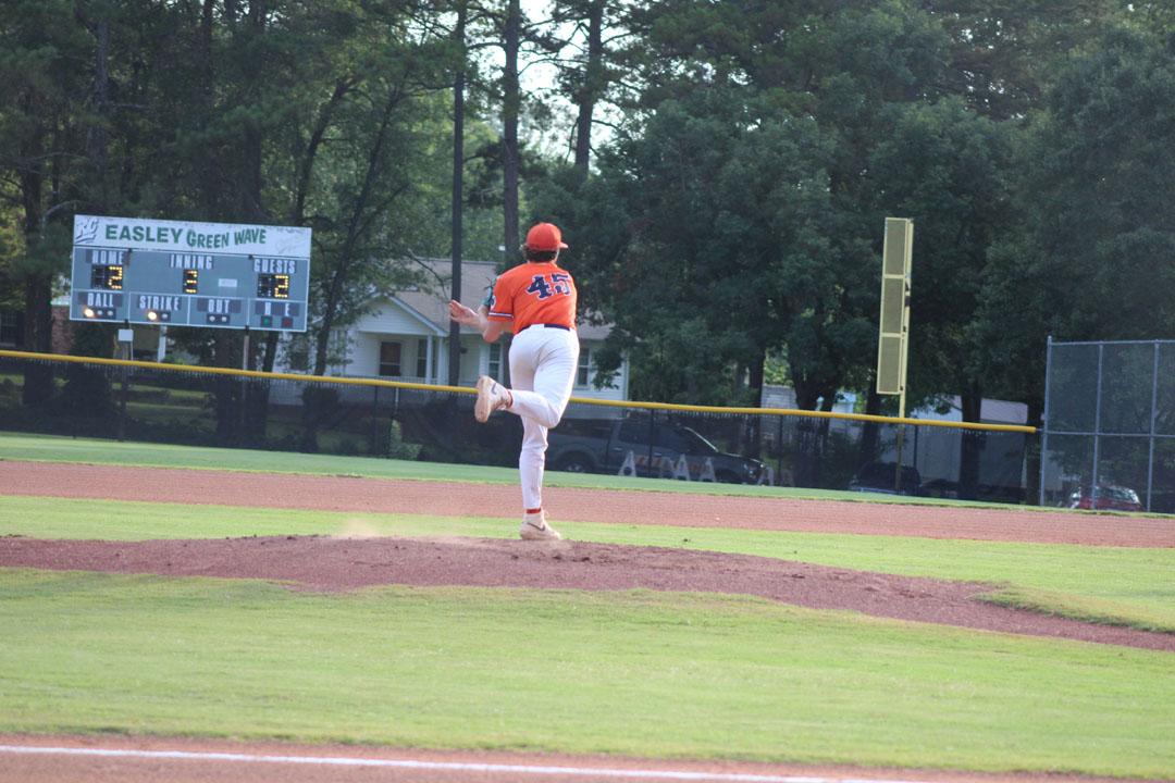 #45 pitcher Ian McCrary throws to first baseman #13 Tye Miller