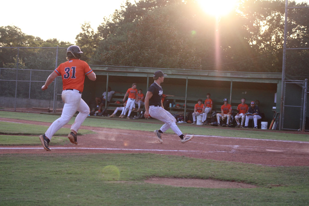 #31 Zach Jochimsen slides home