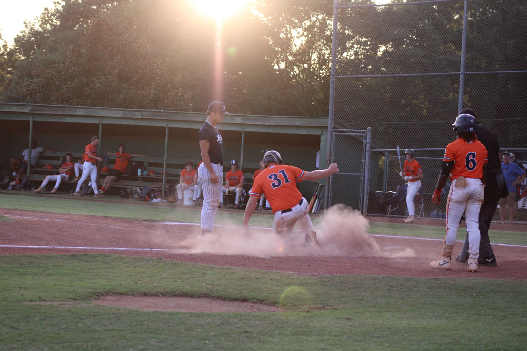 #31 Zach Jochimsen slides home