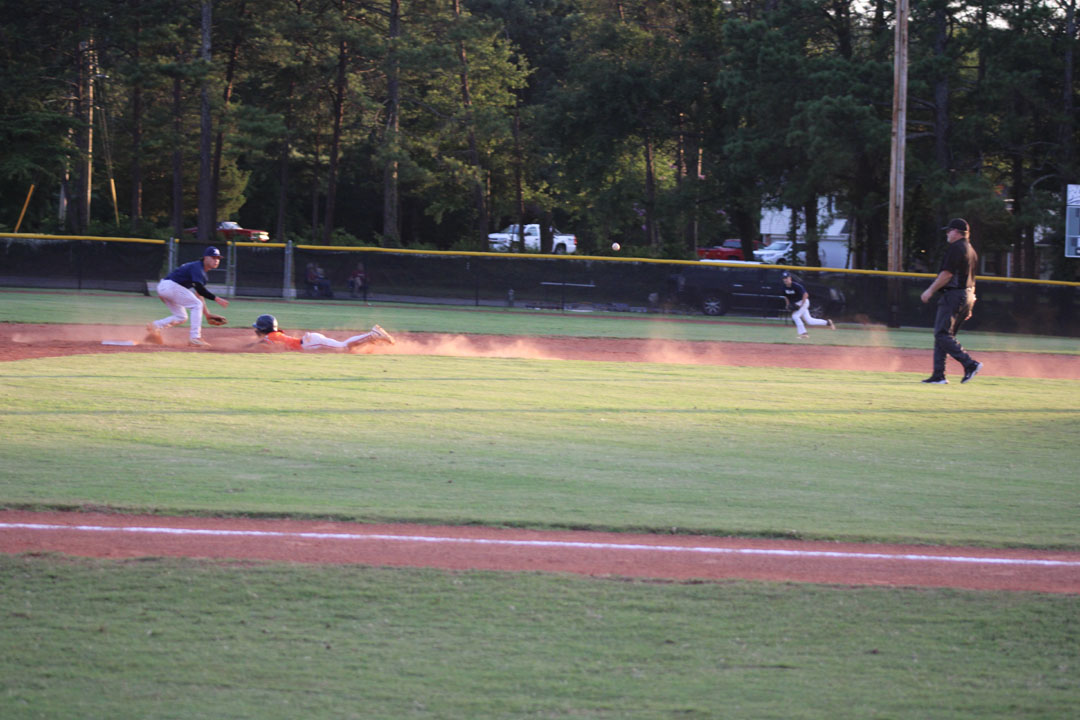 #6 Jasean Perry slides into second