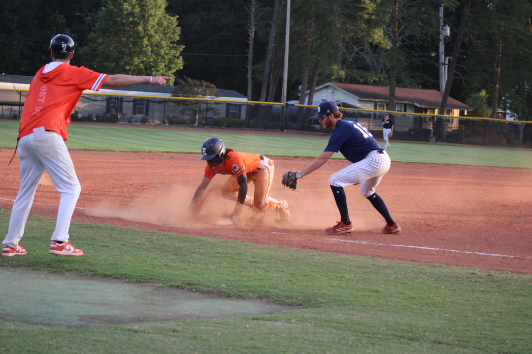 #6 Jasean Perry steals to third base