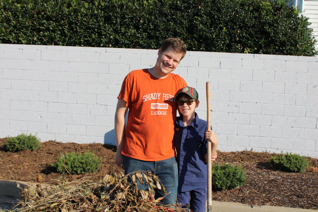 Cub Scout Nathan Gemkow with his father, John (Photo by Karen Brewer, The Pickens County Chronicle)