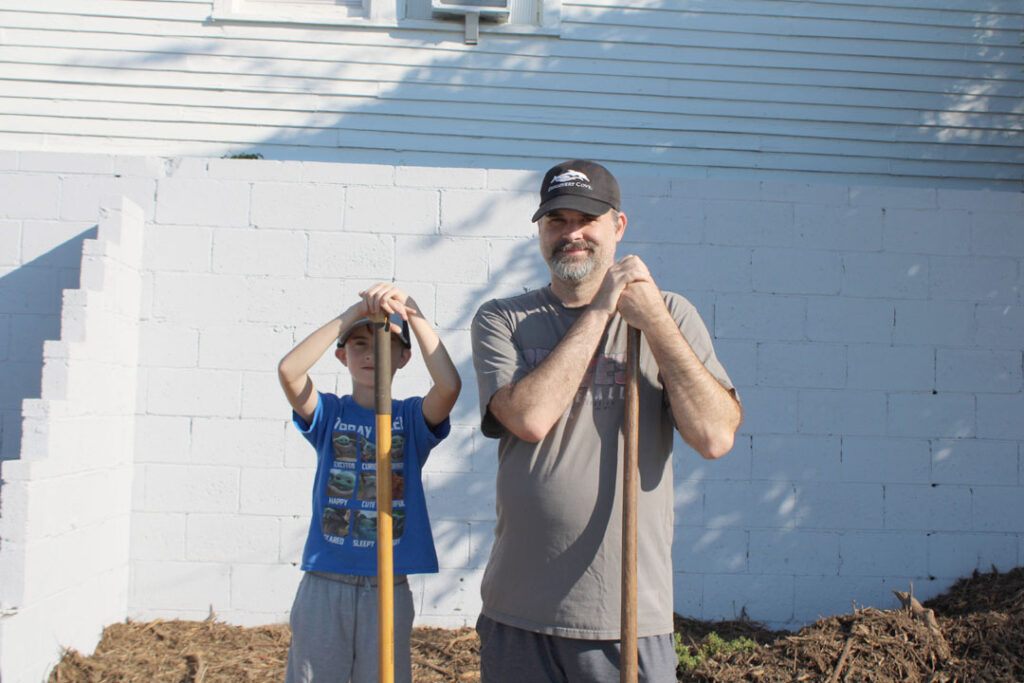 Sam Holland with father, David