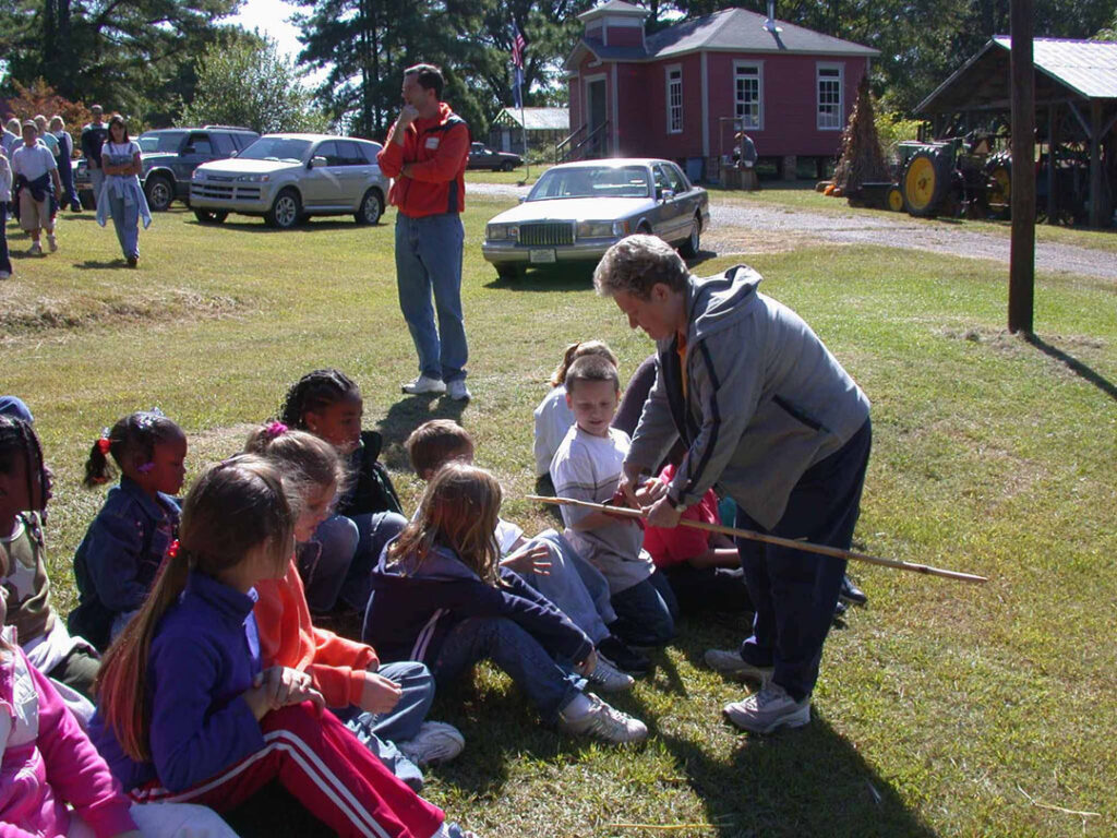ANNE SHERIFF GIVING CANE TO CENTRAL ELEMENTARY SCHOOL STUDENTS