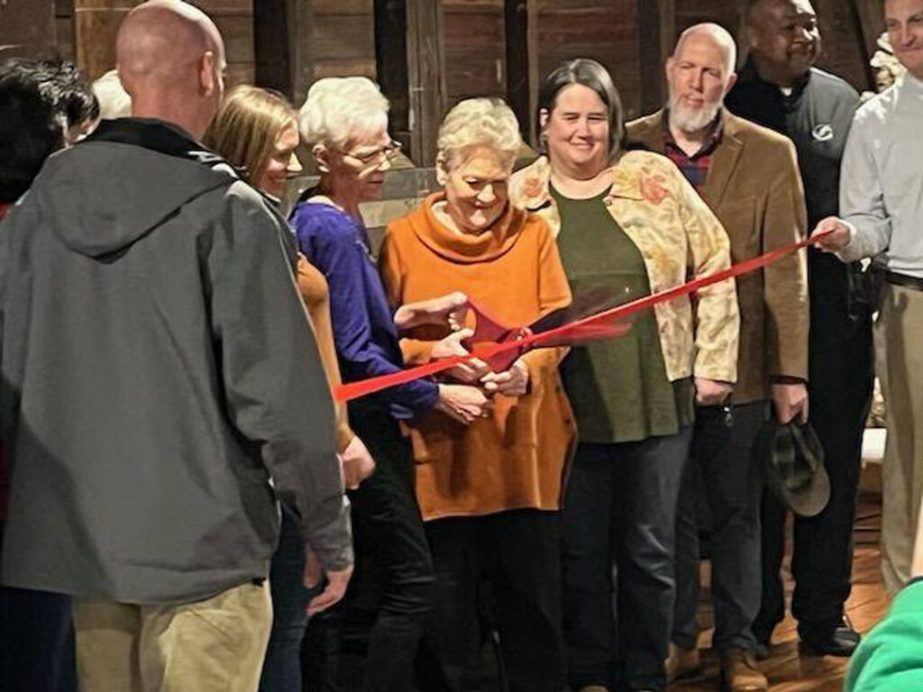 Anne Sheriff cutting ribbon depot (photo courtesy of Tom Cloer)