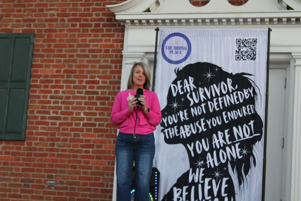 The Hiding Place's Board President Donna Martin speaks.