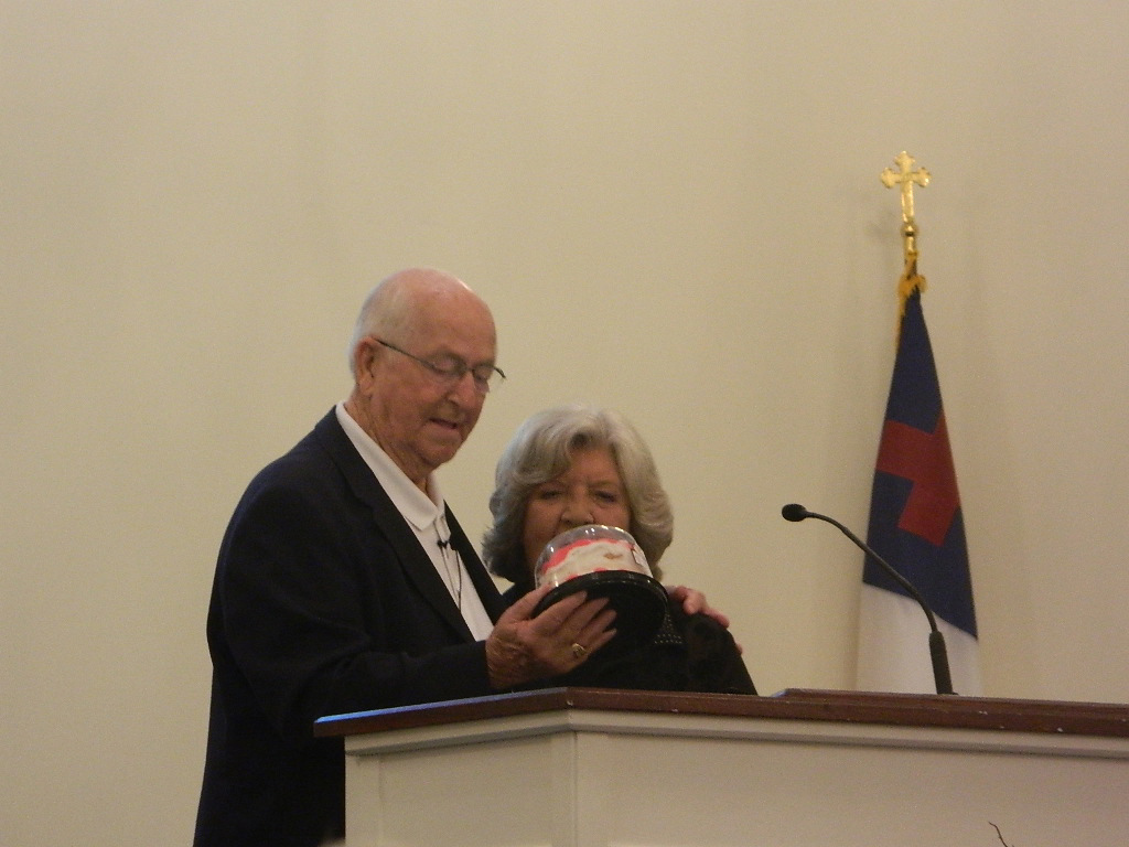 Jack presents Shirley with a birthday cake at Victory Chapel Baptist Church on May 1, 2014 (Photo by Karen Brewer)