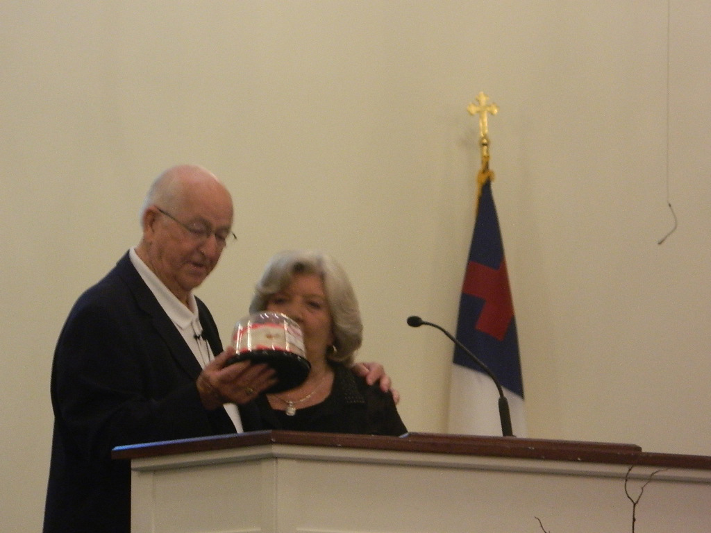 Jack presents Shirley with a birthday cake at Victory Chapel Baptist Church on May 1, 2014 (Photo by Karen Brewer)