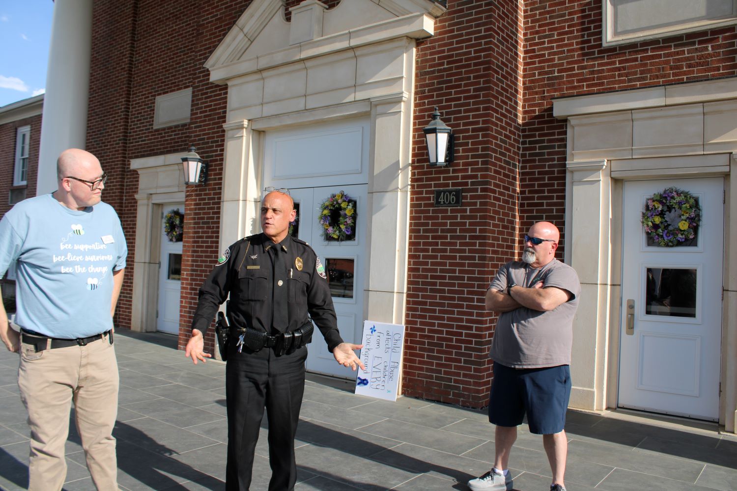 Josh Holder, Pickens Police Chief Randal Beach, and Pastor Bill Bennett