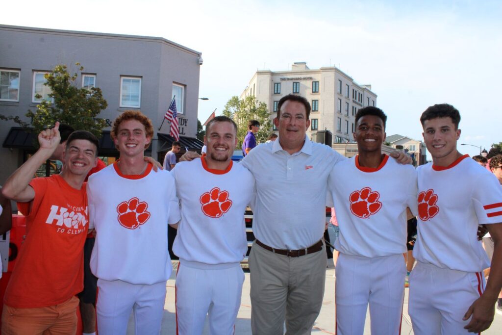 President Ayers and cheerleaders