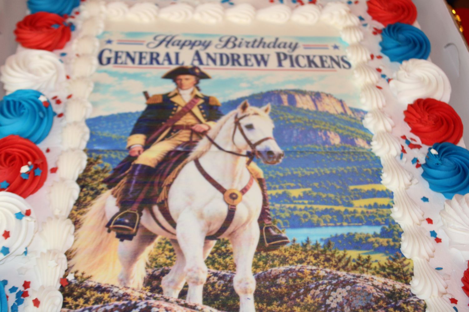 The birthday cake bears the portrait of General Andrew Pickens on horseback. (Photo by Karen Brewer, The Pickens County Chronicle)